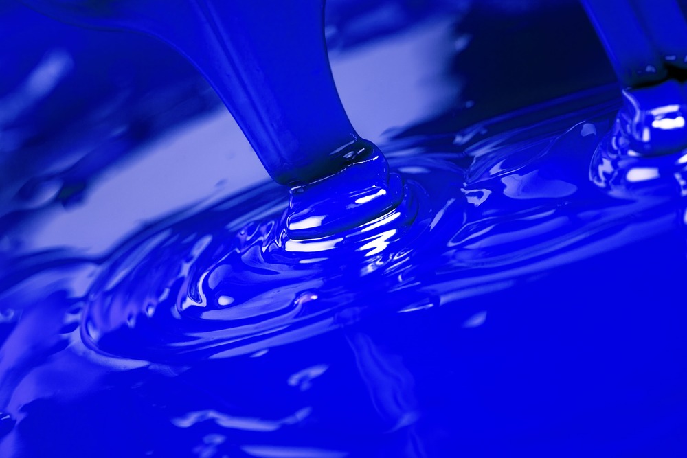 Peinture liquide bleue coulante représentant des Dispersons Pigmentaires